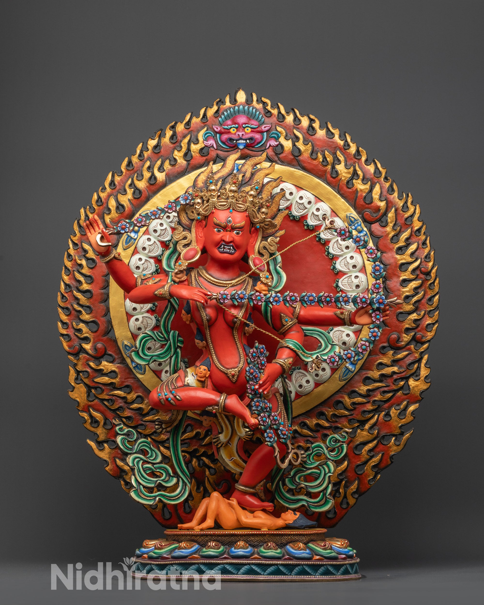 Front view of Red Kurukulla Statue hand-carved with copper base and red acrylic colors