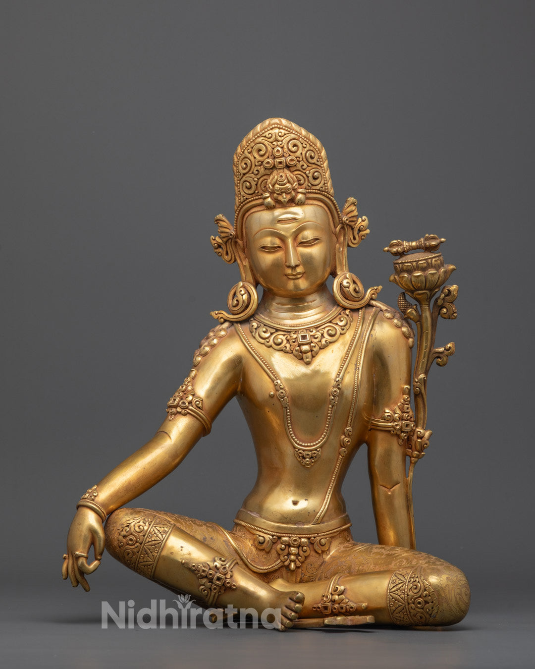 Front view of Sacred Indra Sculpture with gold-gilded face and intricate carvings