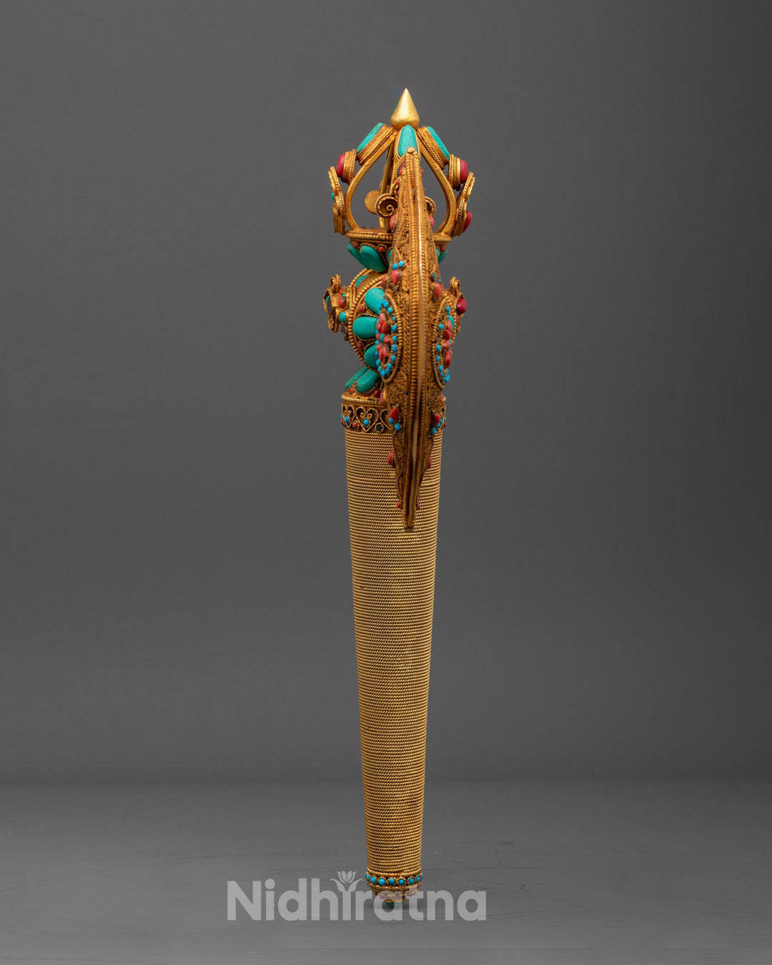 Front view of Sacred Kartika Axe with 24k gold plating and gemstone inlays