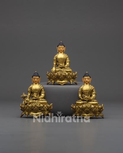 Front view of Sacred Trio Buddha Statue with gold-gilded face and intricate hand-carved details
