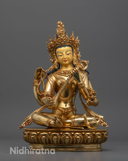Front view of Saraswati Maa statue with 24K gold-gilded face and lotus pedestal details.