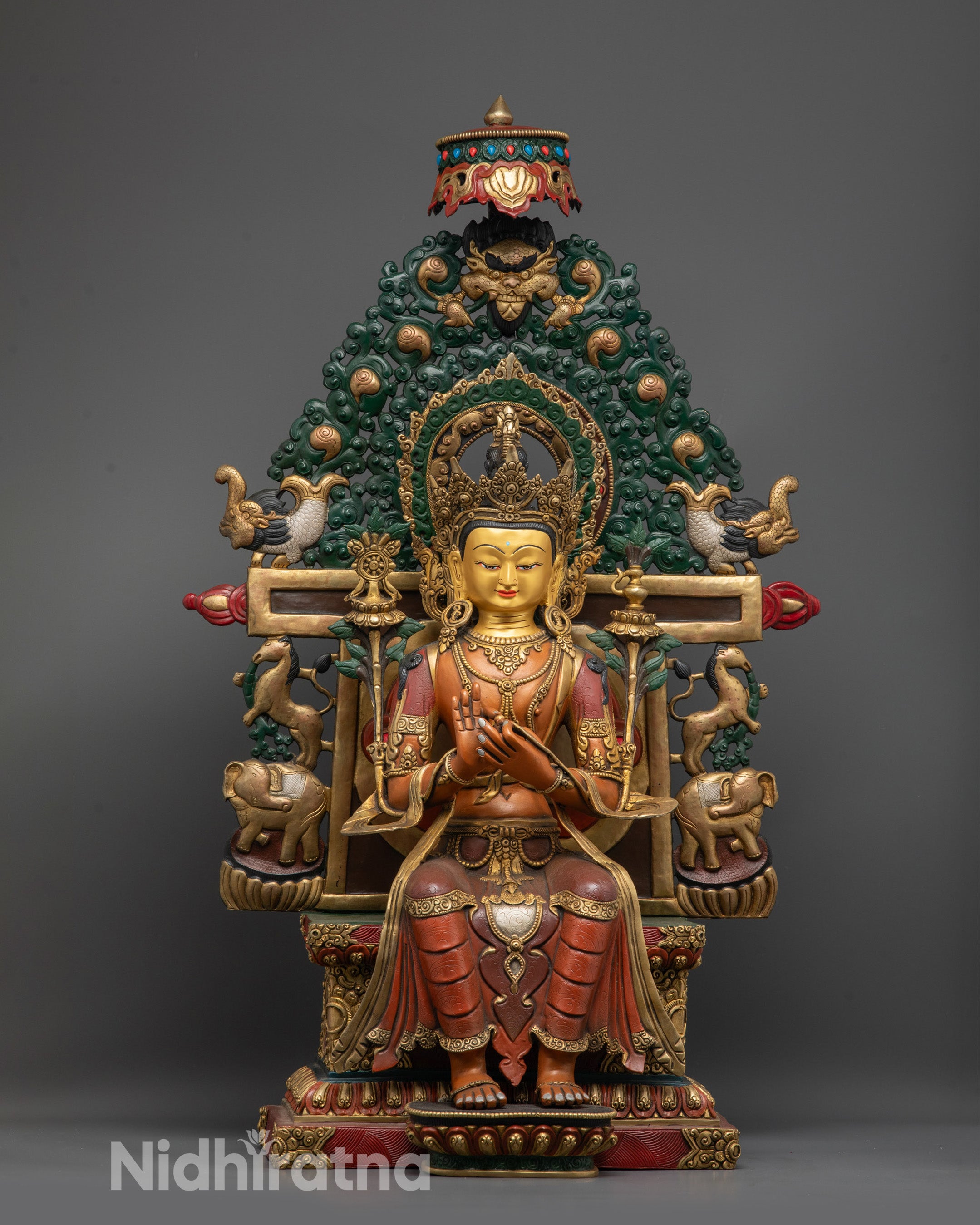Front view of Serene Maitreya Buddha Statue with gold-gilded face and intricate carvings