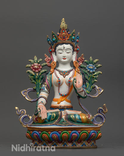Front view of Seven-Eyed Jetsun Drolma statue showing white body and lotus base