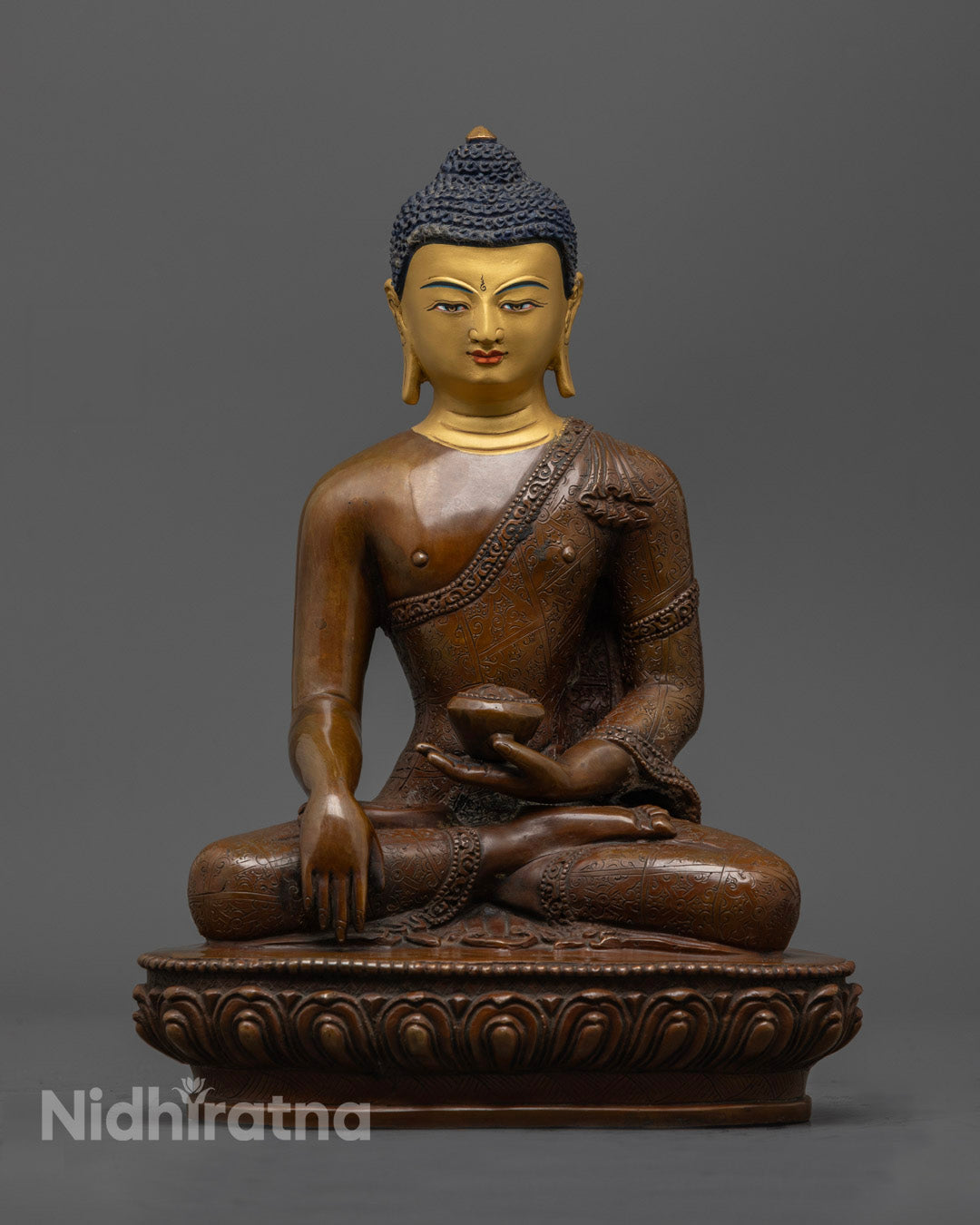 Shakyamuni Buddha Statue in Dhyana mudra, handcrafted from oxidized copper with 24K gold-coated face, seated on a lotus throne