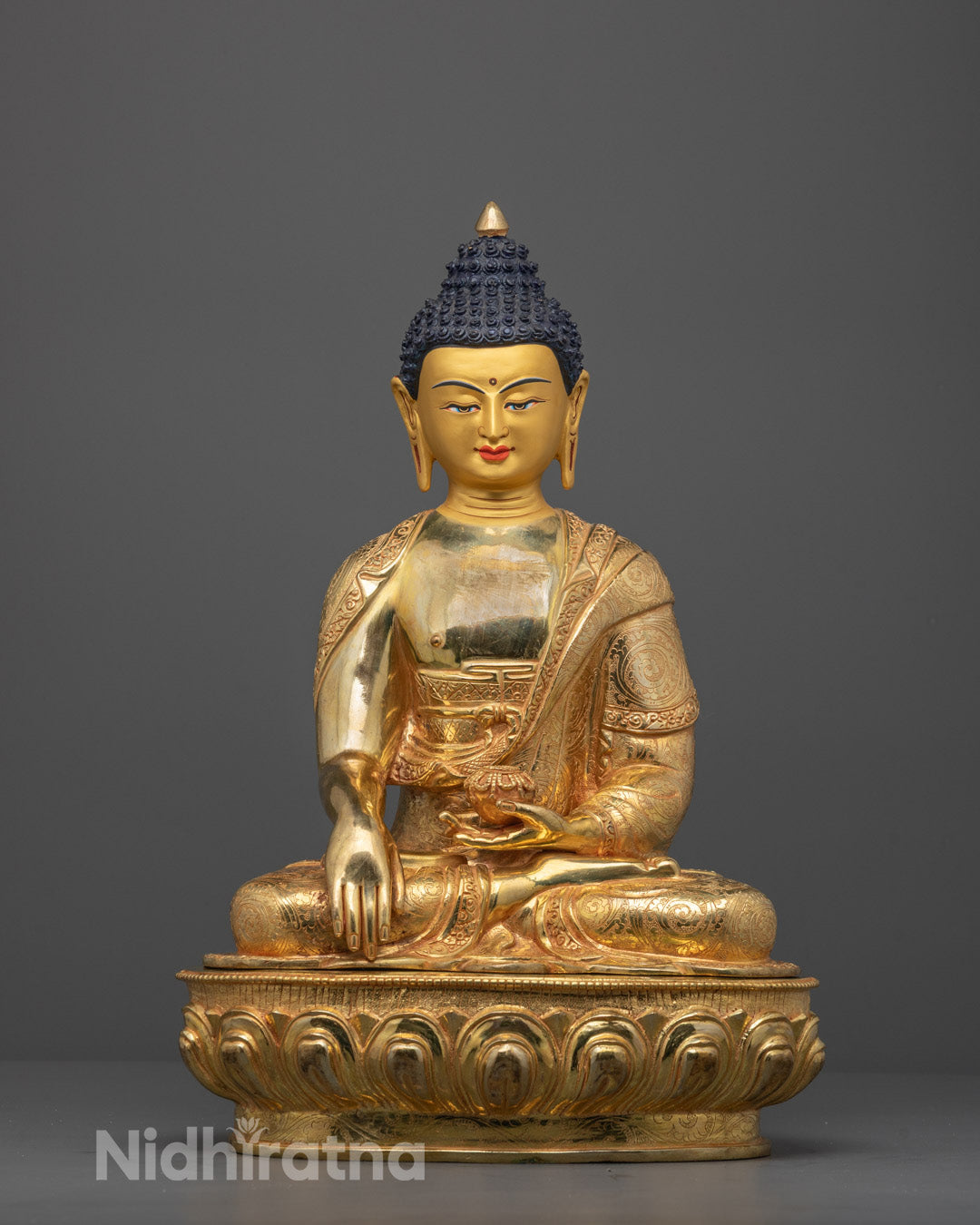 Front view of Shakyamuni Buddha Statue seated on lotus base in Bhumisparsha mudra