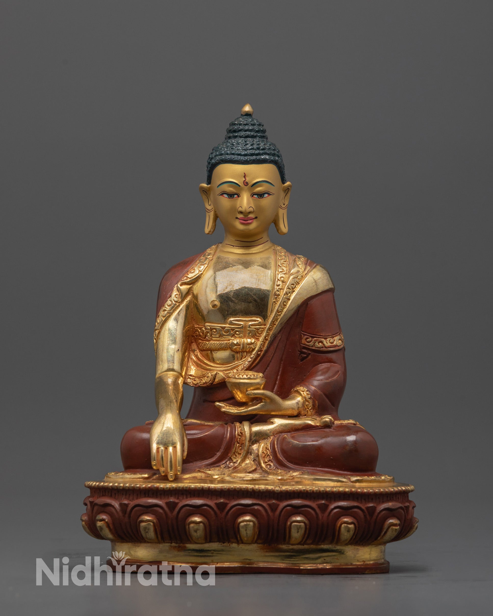 Front view of Shakyamuni Buddha Statue with 24K gold-gilded face and detailed carvings