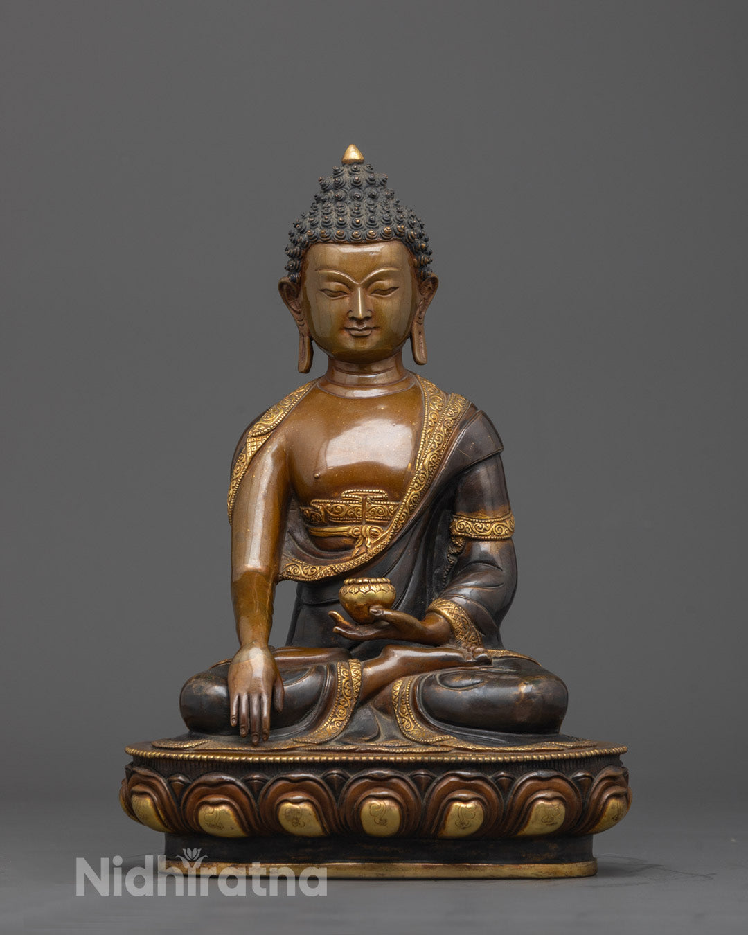 Front view of Shakyamuni Buddha Tibetan Statue with gold-gilded lotus throne