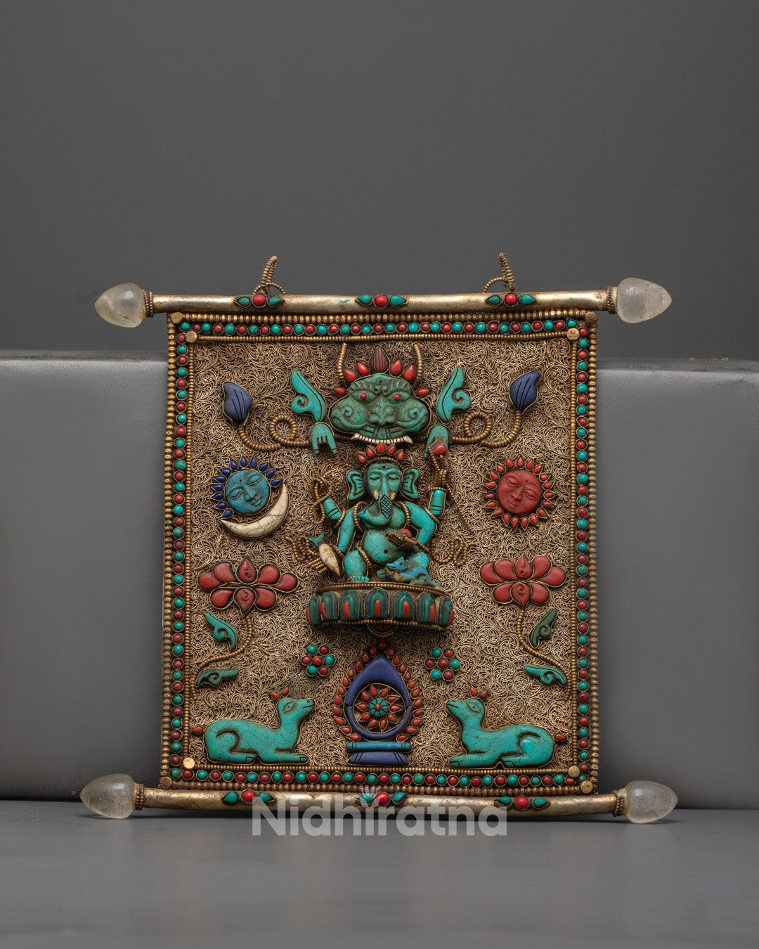 Front view of Shree Ganesh wall hanging with Dharma wheel in copper and gemstone inlay