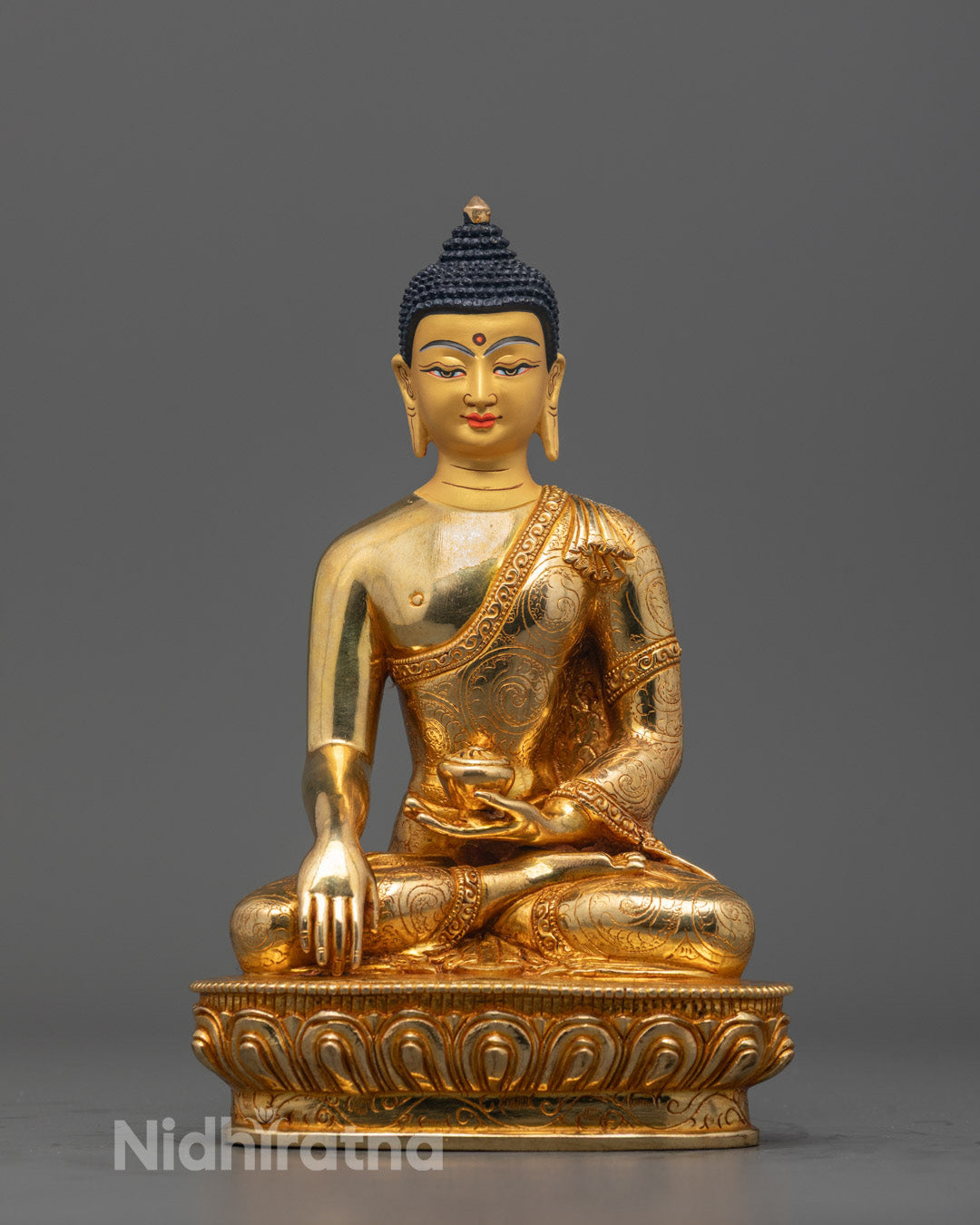 Front view of Siddhartha Gautama Buddha Statue seated on lotus throne