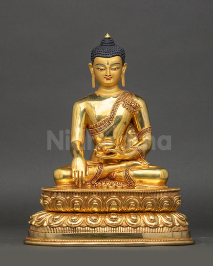 Front view of Siddhartha Gautama Buddha statue 24K gold-gilded lotus meditation art