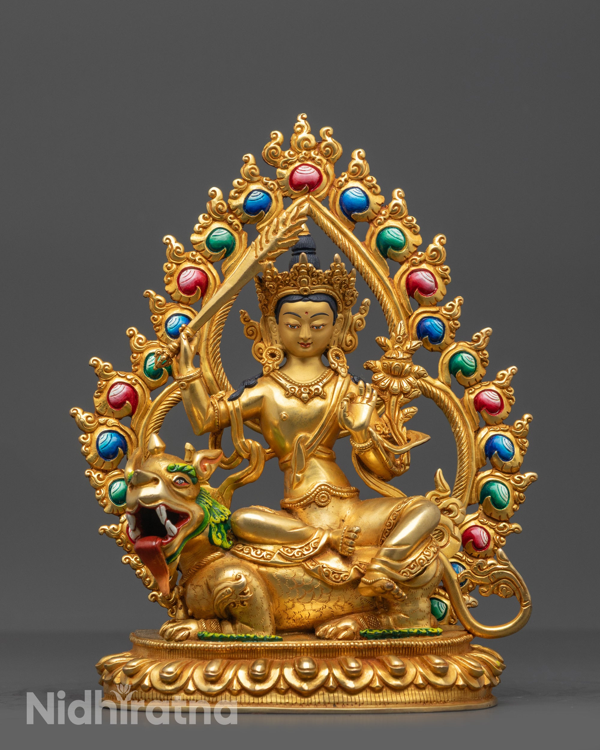 Front view of Simhada Manjushri Statue with sword, lotus, and gold-gilded details