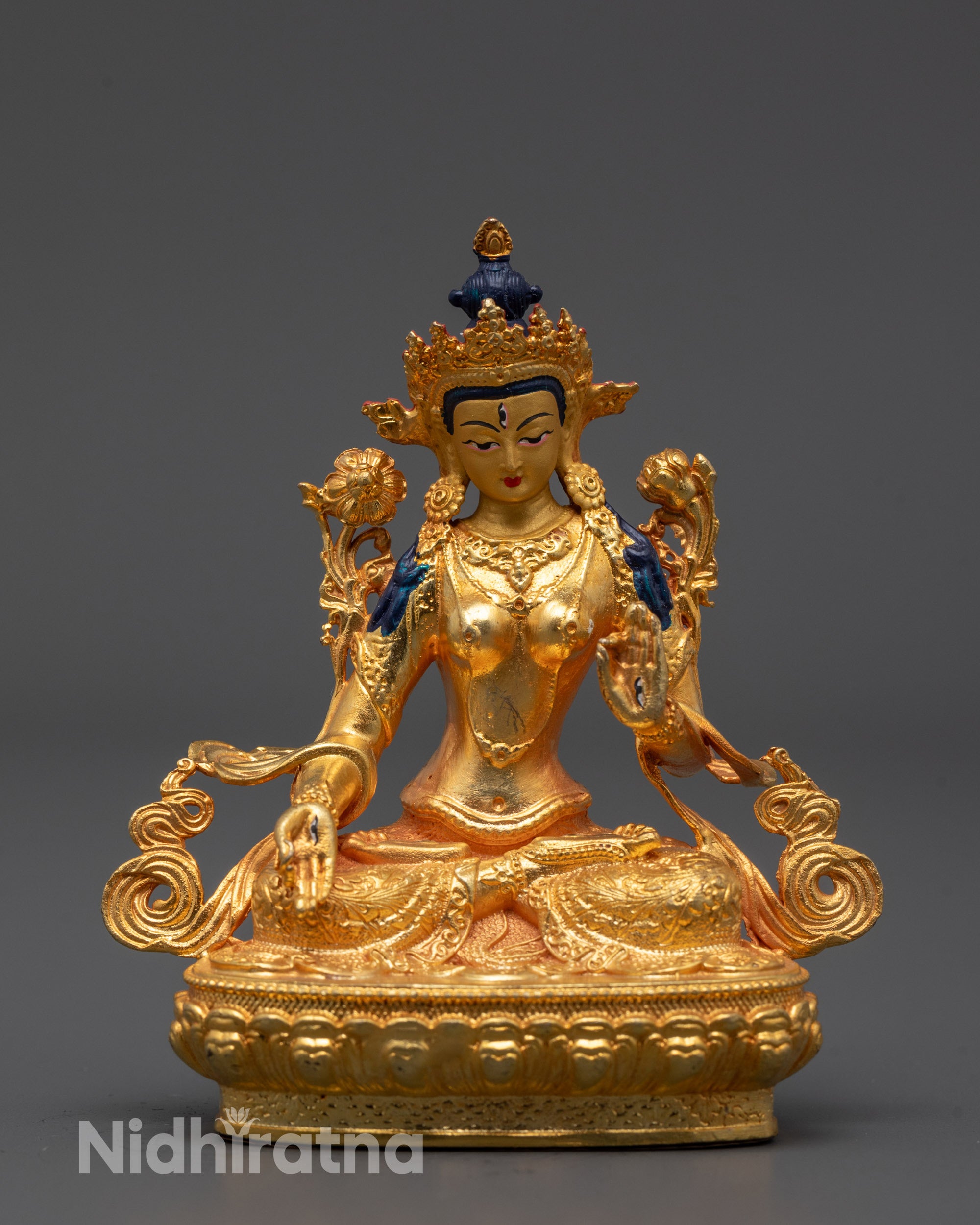 Front view of Sita Tara statue showing gold-gilded face and precision-carved five-jeweled crown