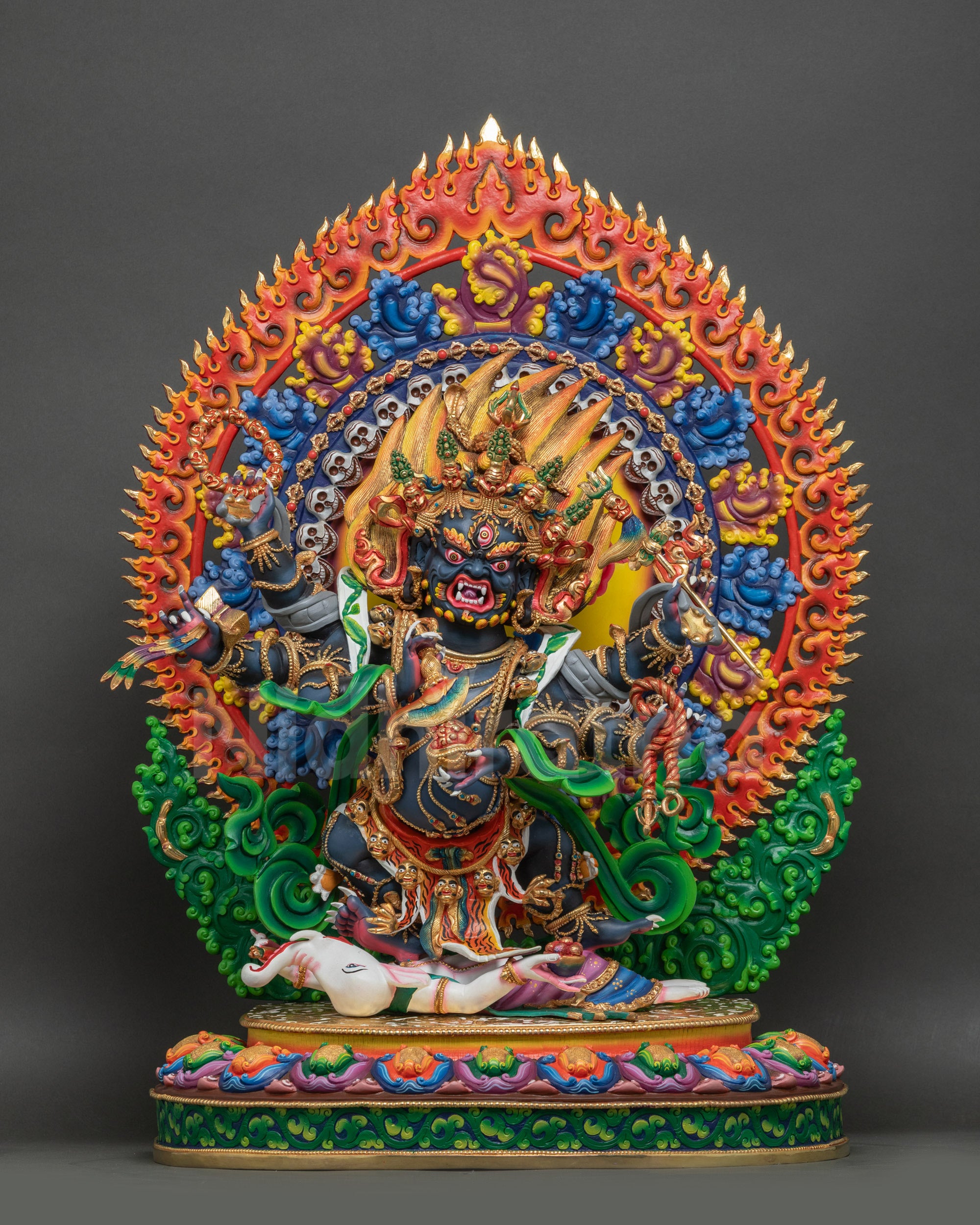 Front view of Six-Armed Mahakala Statue handcrafted in Nepal with wrathful expression and copper detailing