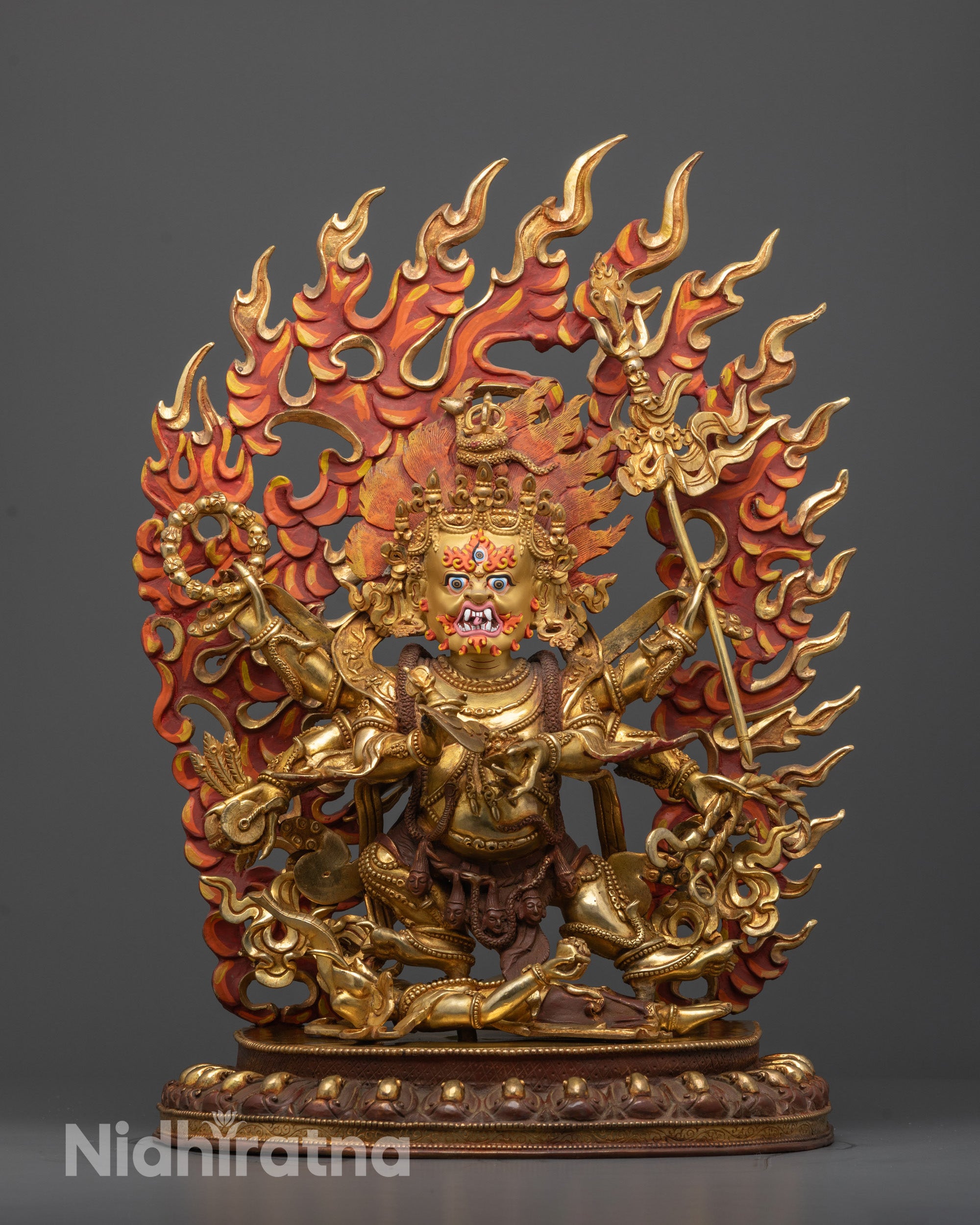 Front view of Six-Armed Mahakala Statue with 24K gold-gilded face and gold fire-gilded body