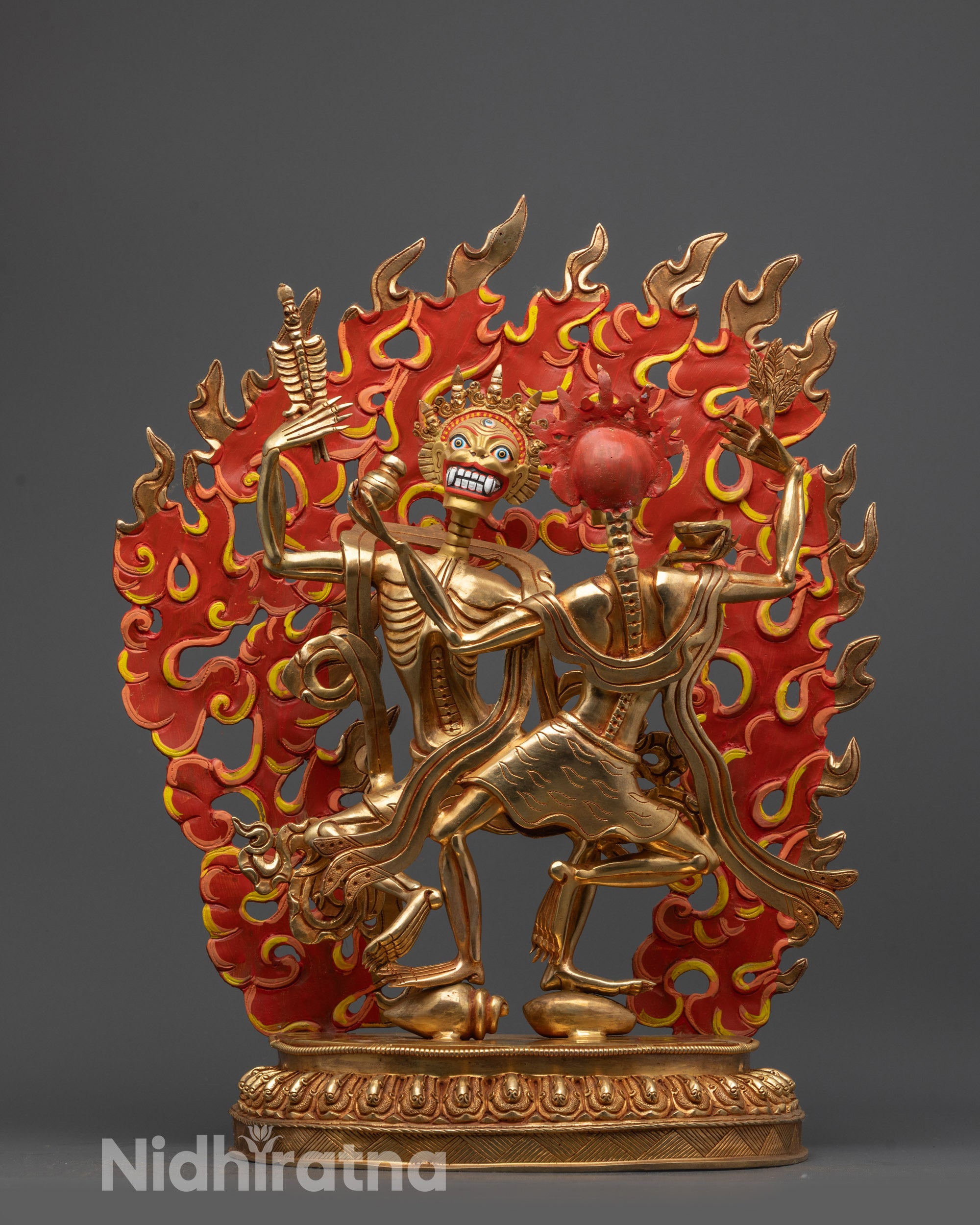 Front view of Skeleton Deity Chitipati Statue showing dancing male and female skeletons