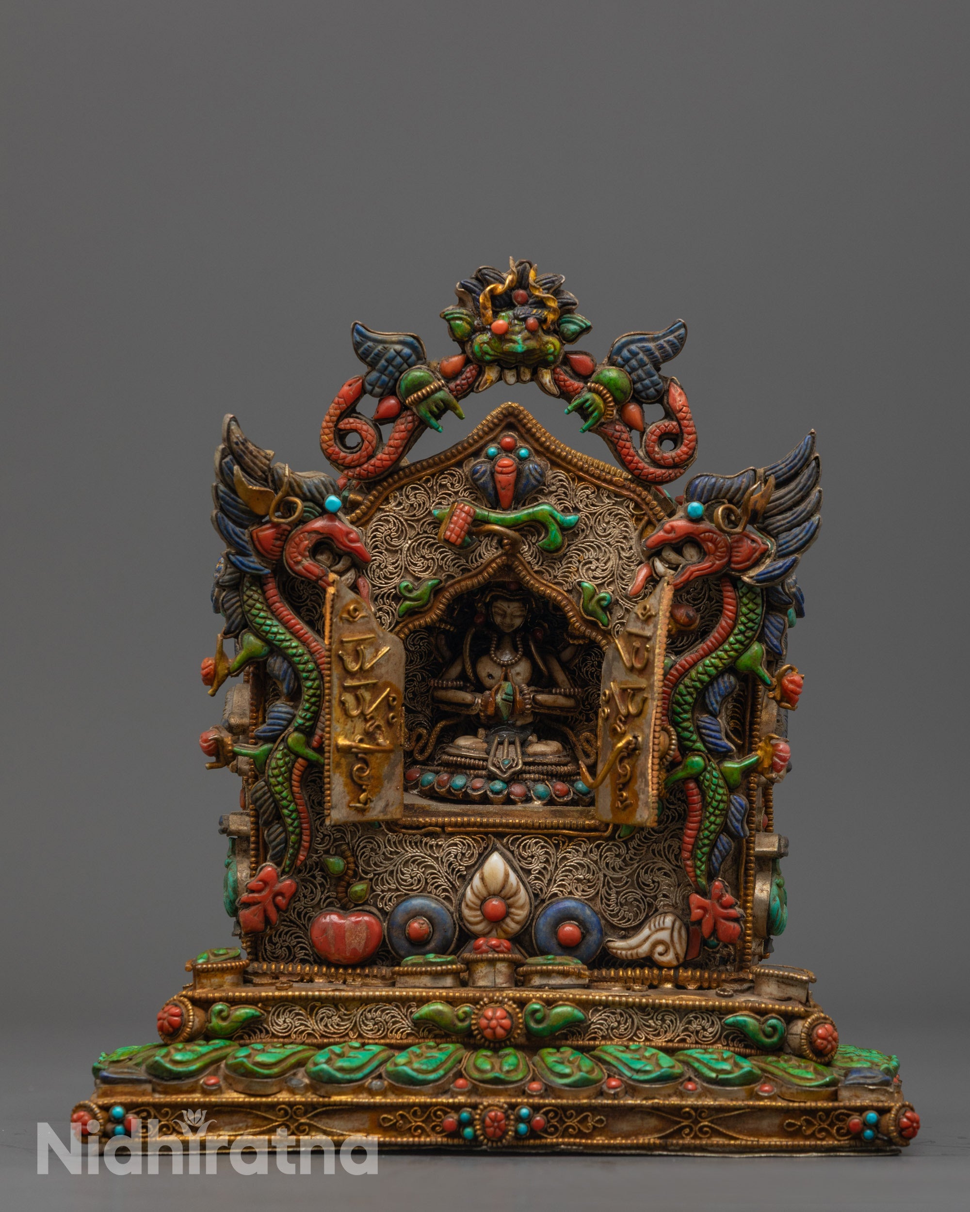 Front view of Spiritual Chenrezig Ghau Box with gold and silver plating
