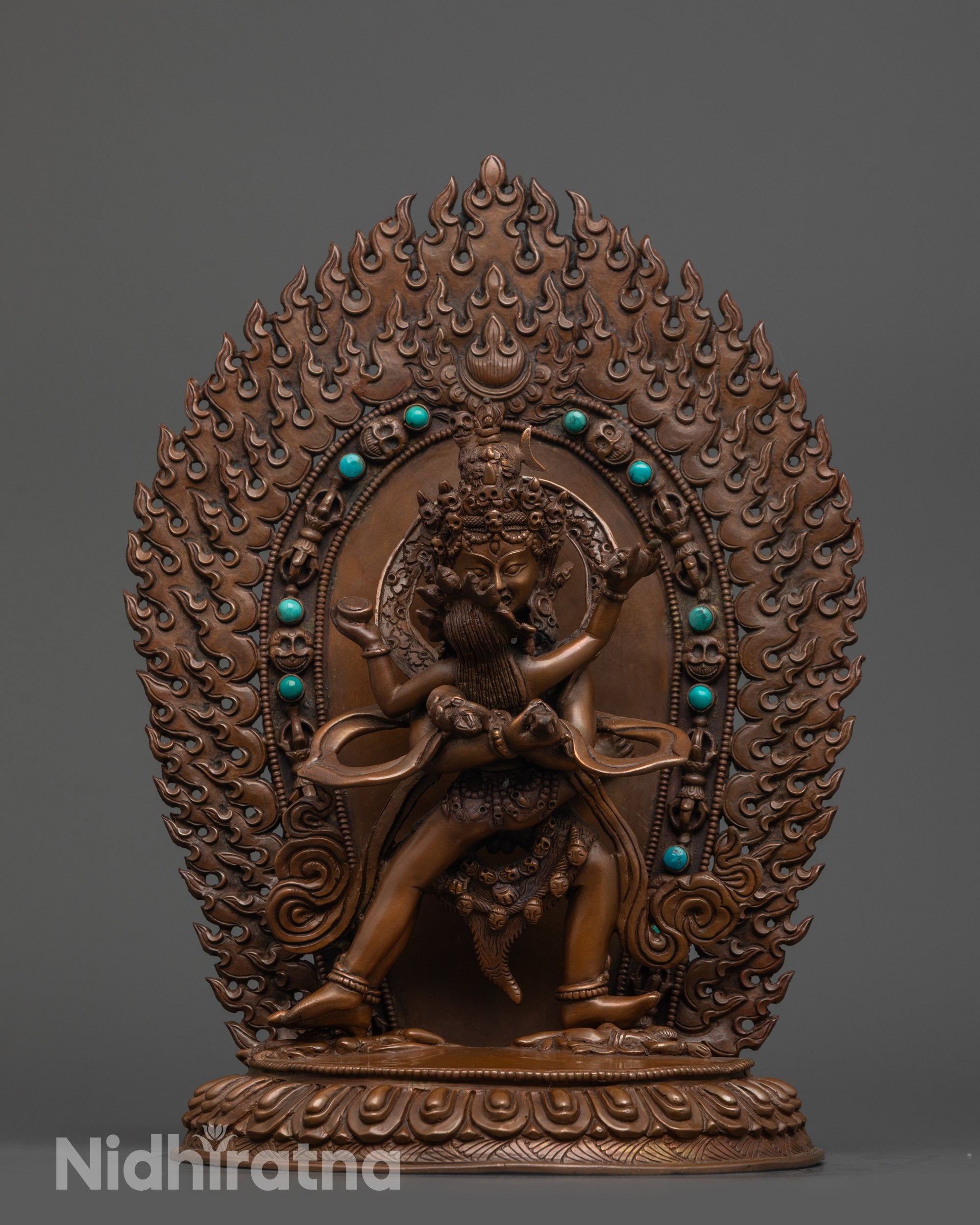 Front view of Tantric Chakrasamvara Consort Statue in oxidized copper with blazing halo