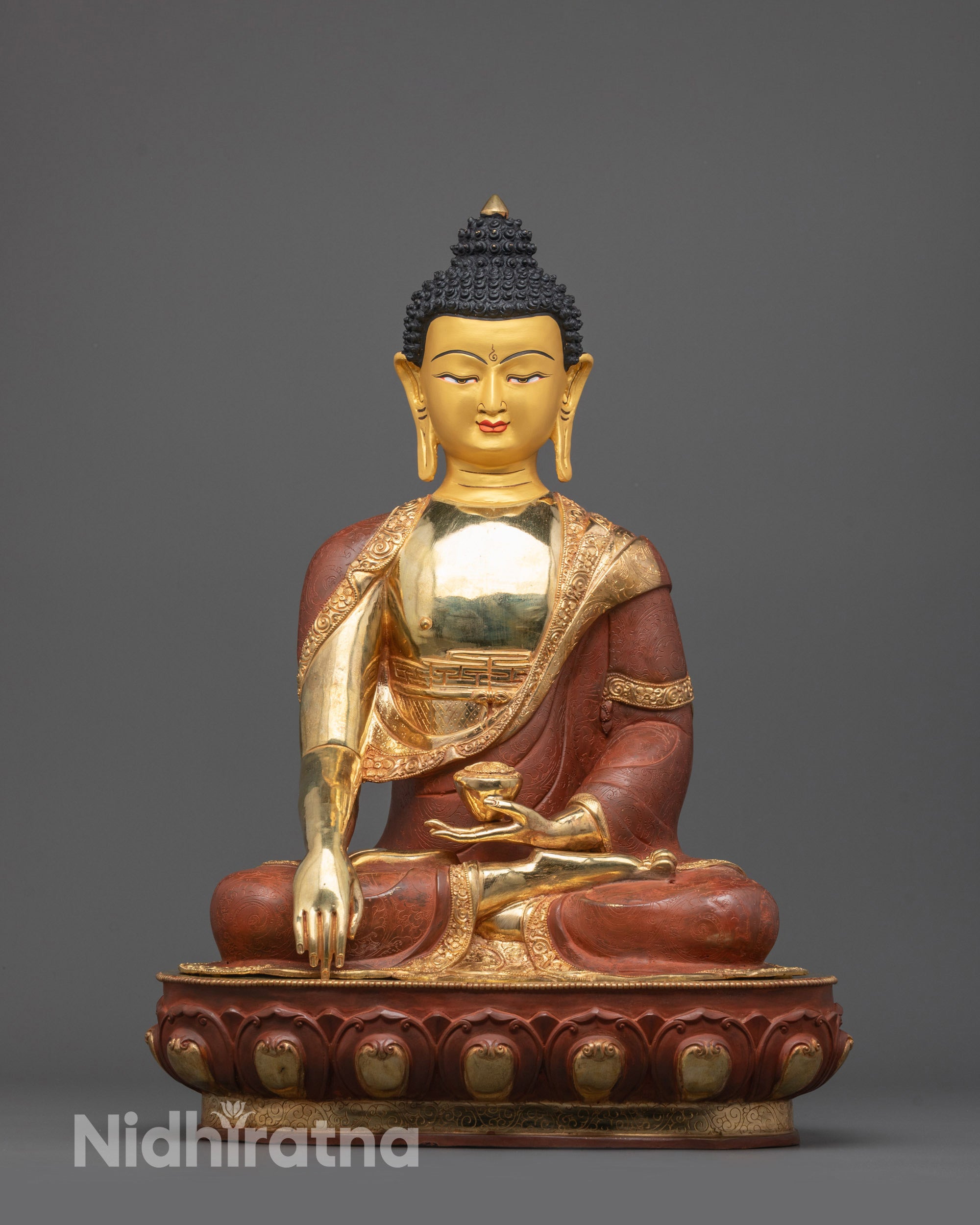 Front view of Tathagata Buddha Shakyamuni Statue with gold-gilded face and detailed robe