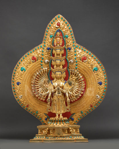 Front view of Thousand-Arm Chenrezig statue with gold fire-gilding on copper and lotus throne
