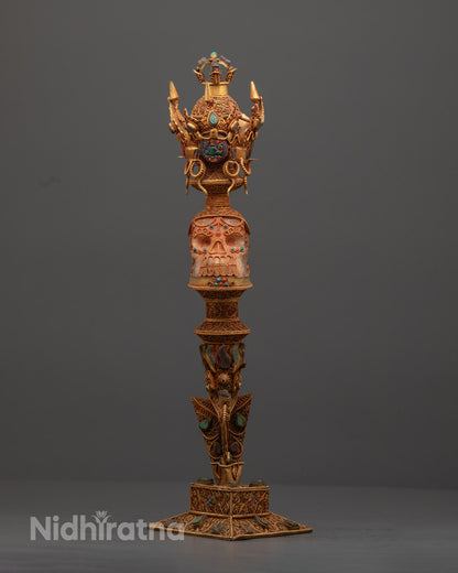 Front view of Tibetan Crystal Phurba with copper details and semi-precious stone inlays