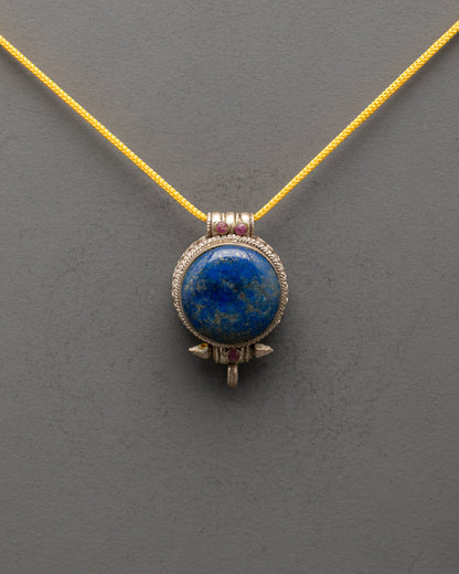 Front view of Tibetan Lapis Lazuli Pendant with intricate silver design and blue stone
