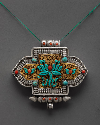 Front view of Tibetan Lotus Locket pendant with silver body and coral turquoise stones
