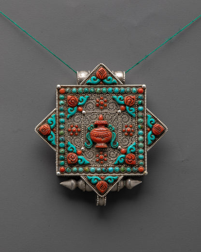 Front view of Tibetan Treasure Vase Locket with silver body and coral turquoise stones close up