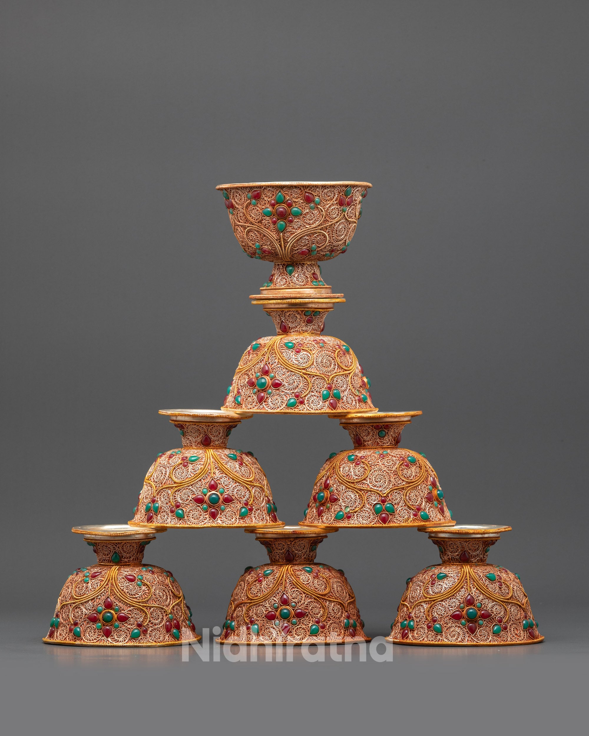 Front view of Tibetan Water Offering Bowl with gold-plated filigree and stones