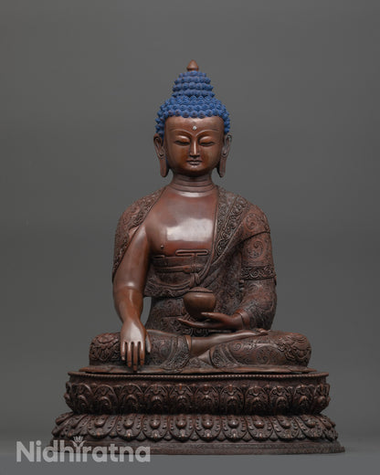 Front view of Timeless Shakyamuni Buddha Statue with alms bowl and intricate robe details