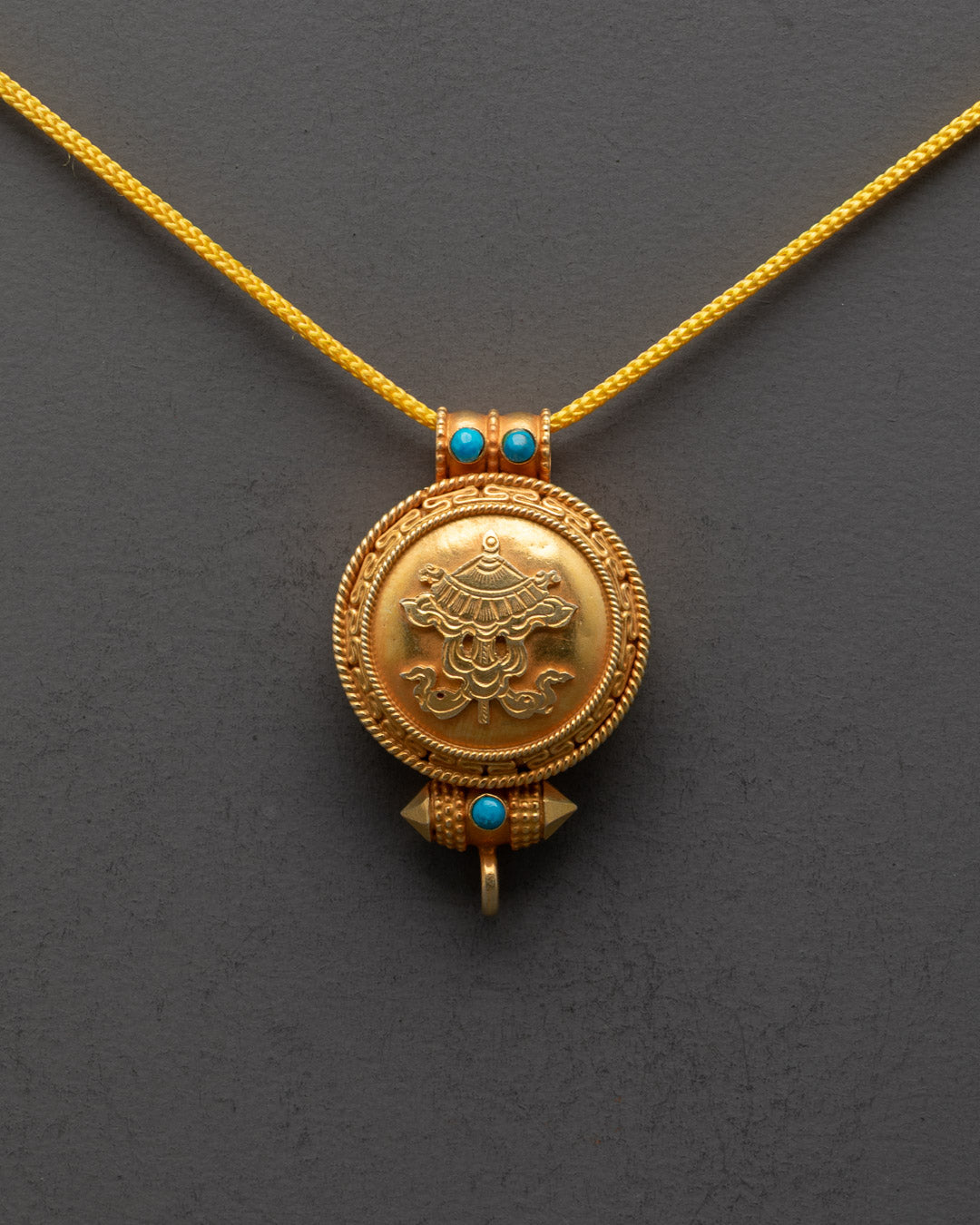 Front view of Unique Parasol Locket with gold-gilded body and semi-precious stones