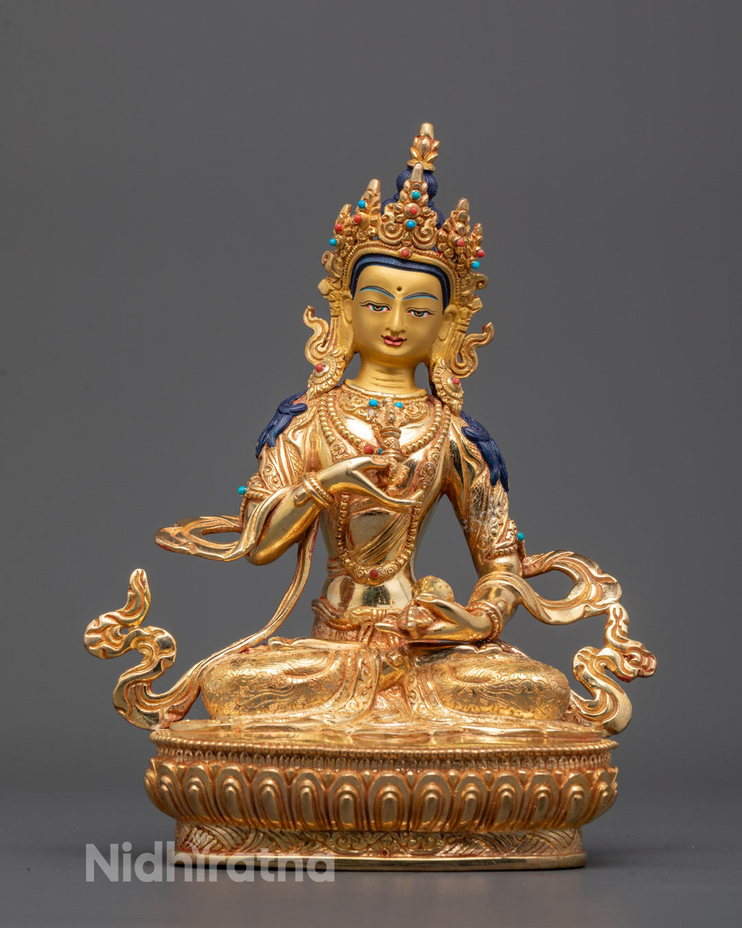 Front view of Vajrasattva Dorje Sempa sculpture with gold-gilded face and vajra