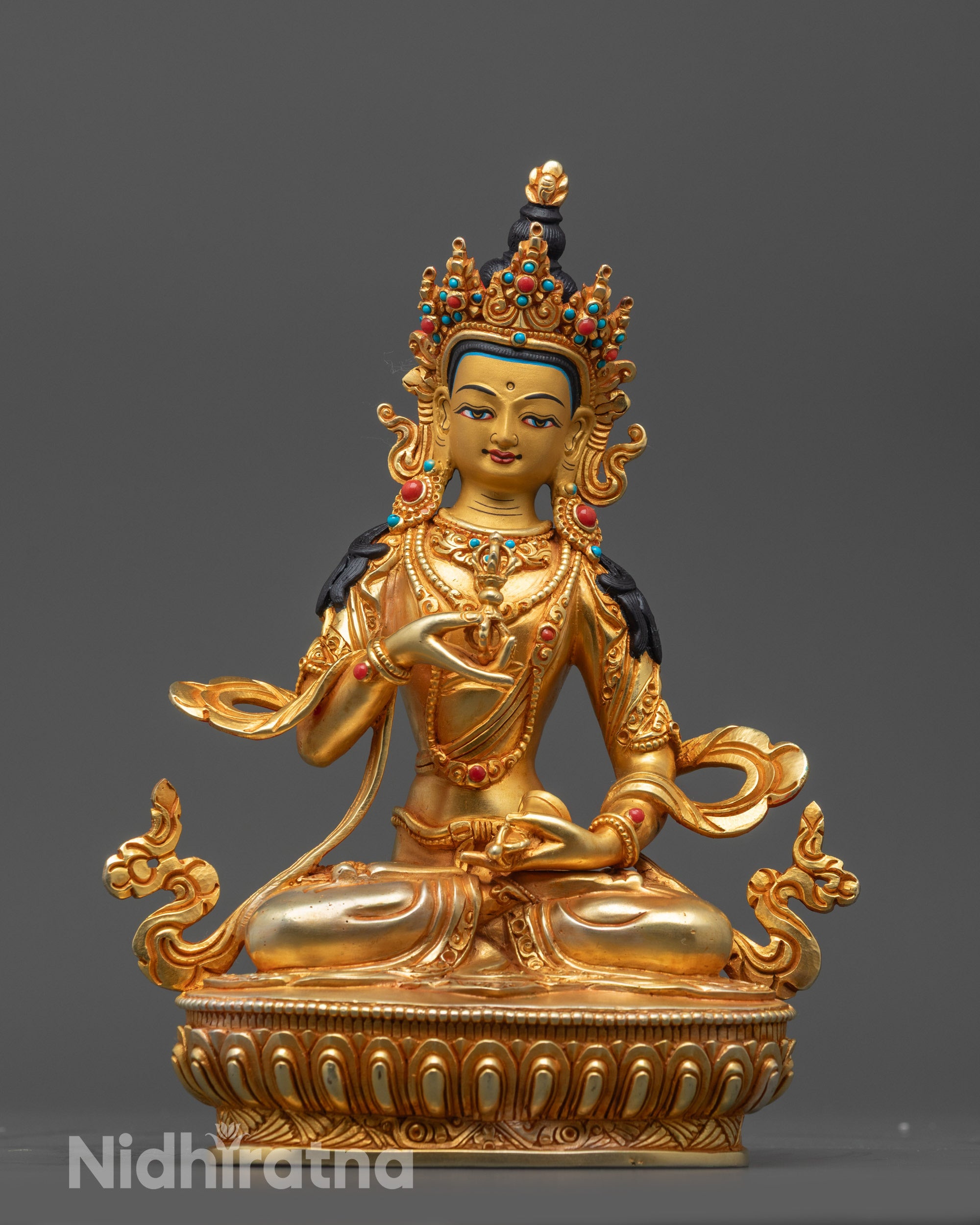 Front view of Vajrasattva Statue with gold-gilded face and lotus seat details