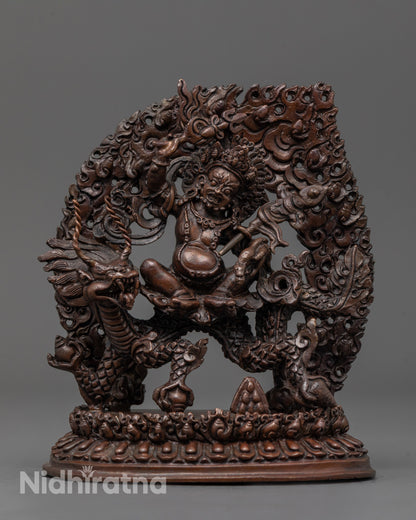 Front view of White Dzambhala Statue riding dragon with sword and mongoose
