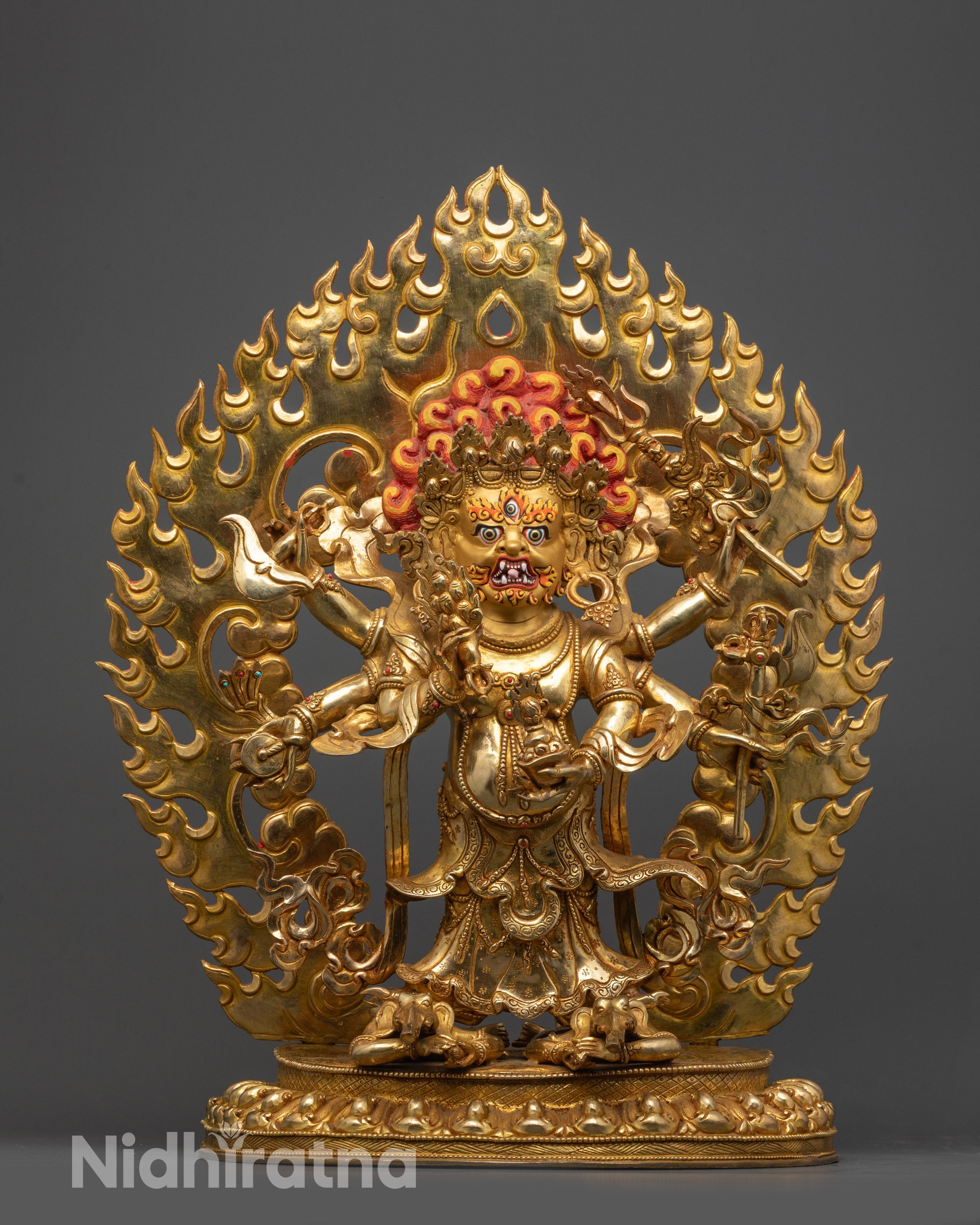 Front view of White Mahakala Statue from Nepal with gold-gilded face and fire-gilded body