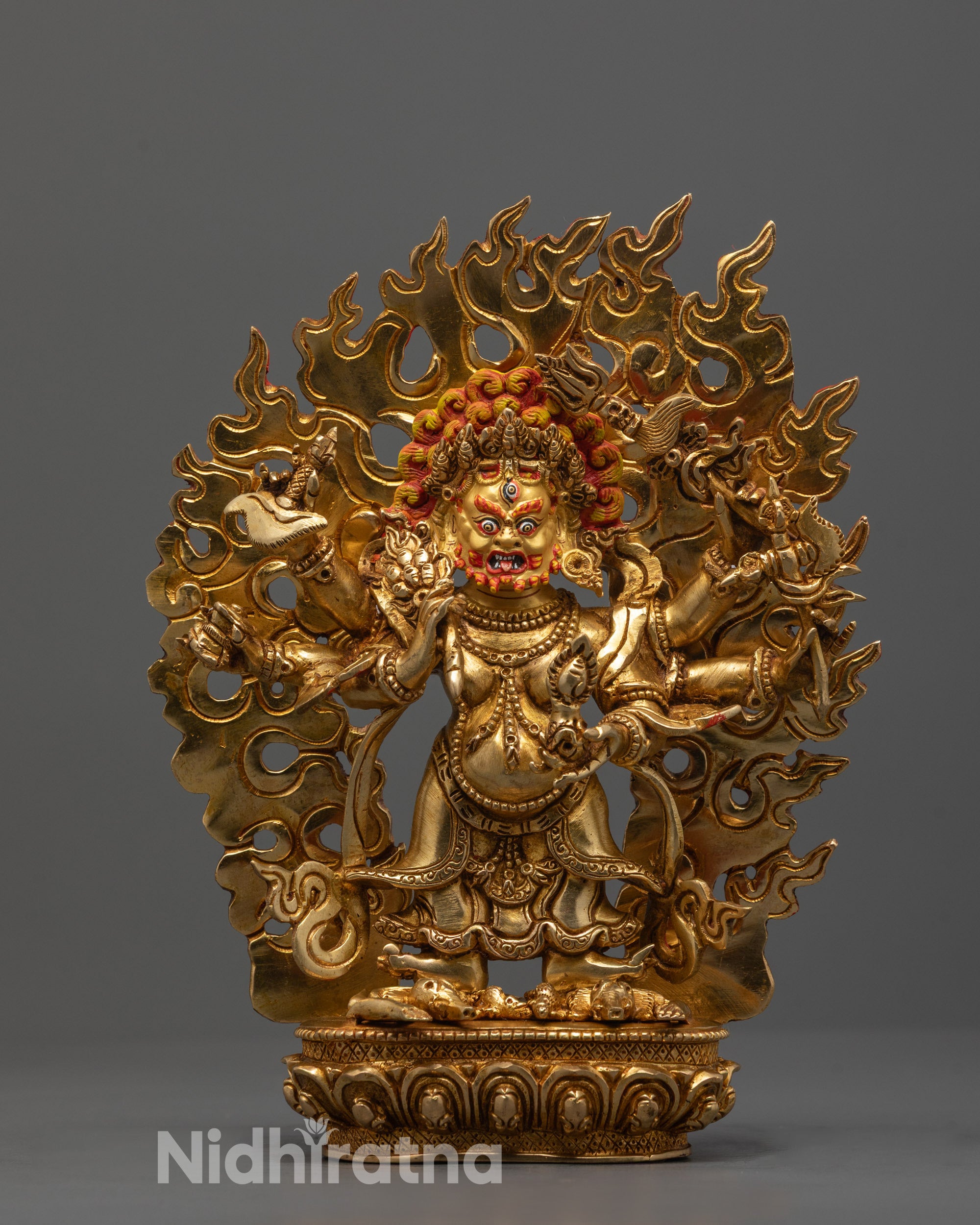 Front view of White Six-Armed Mahakala statue standing on lotus base
