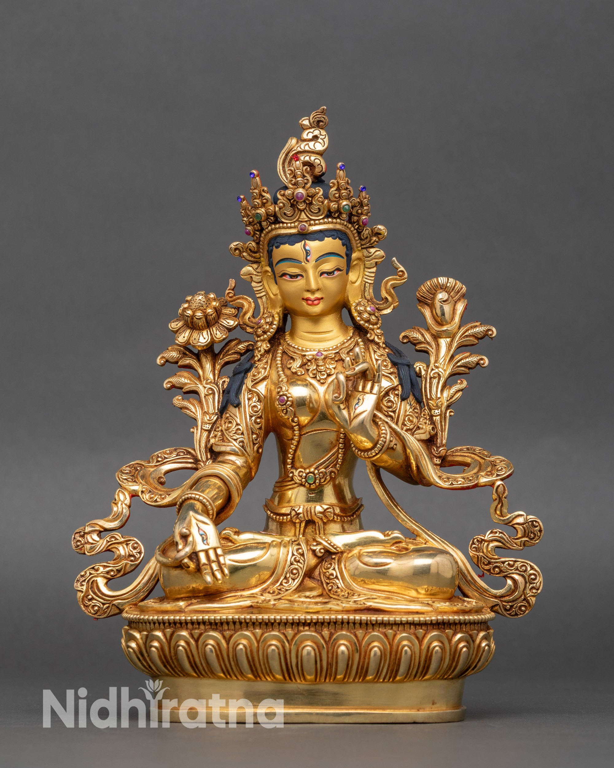 Front view of White Tara Statue, handcrafted Nepalese copper with gold and stones