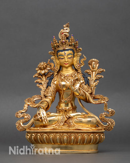 Front view of White Tara Statue, handcrafted Nepalese copper with gold and stones