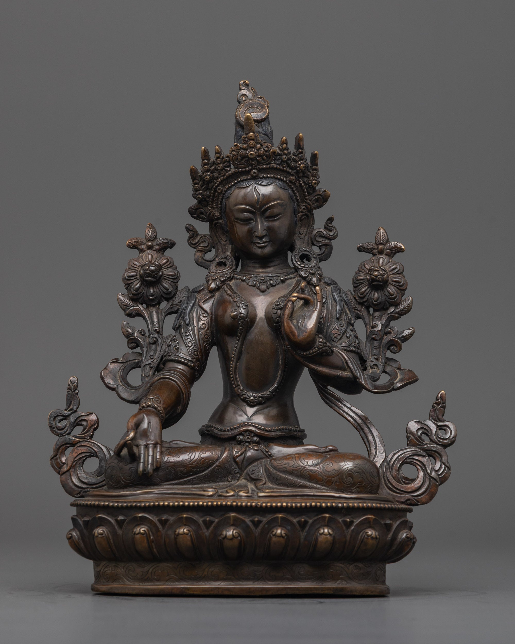 Front view of White Tara Statue seated on lotus base