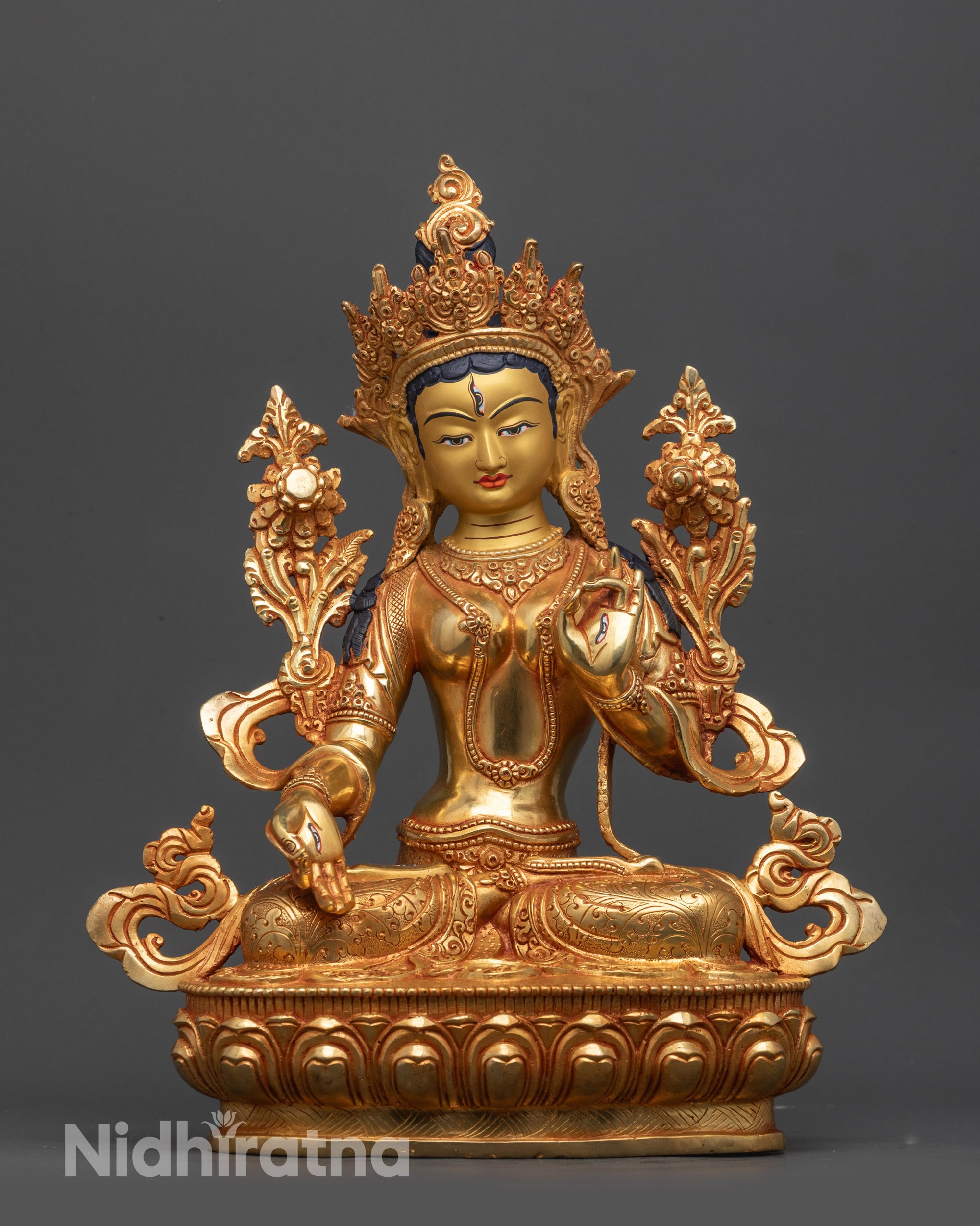 Front view of White Tara Statue with gold-gilded face and 24k fire-gilded body on lotus

