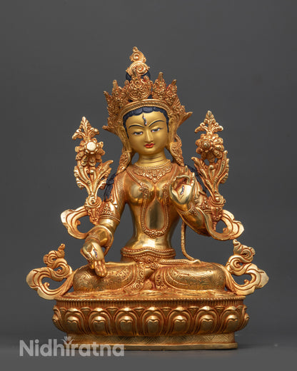Front view of White Tara Statue with gold-gilded face and 24k fire-gilded body on lotus
