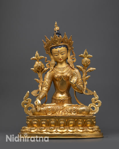 Front view of White Tara Statue with serene face, seven eyes, and lotus seat
