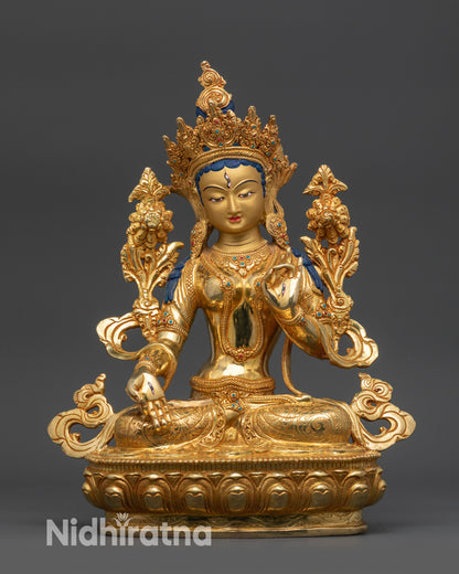 Front view of White Tara statue, gold-gilded copper, lotus seat, meditation décor
