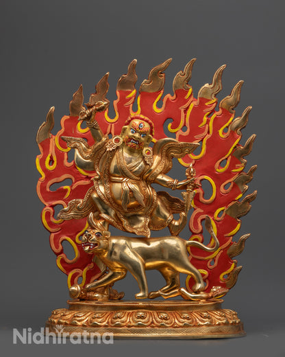 Front view of Wrathful Dorje Drolo statue standing on tigress with gold fire-gilded body