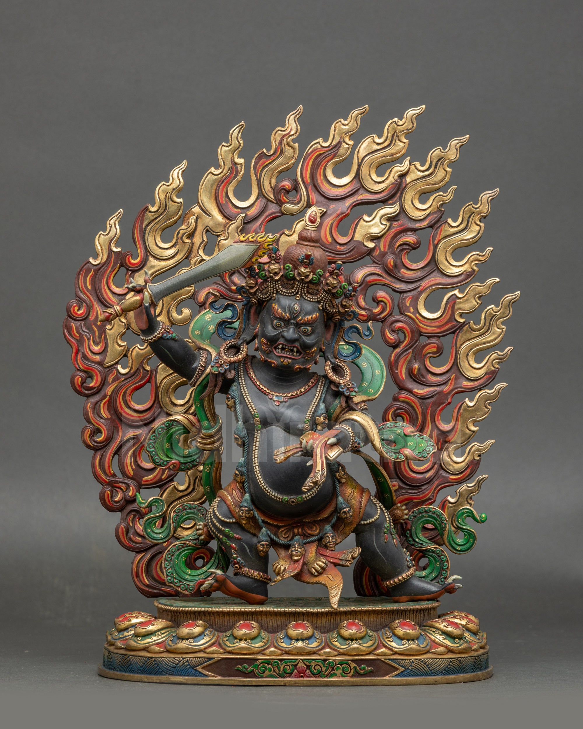 Front view of Wrathful Manjushri statue with sword and Sutra, intricate details visible