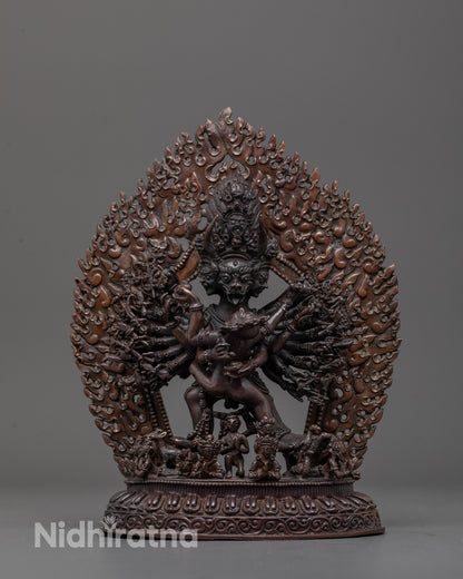 Front view of machine-made Yamantaka Consort statue with oxidized copper finish