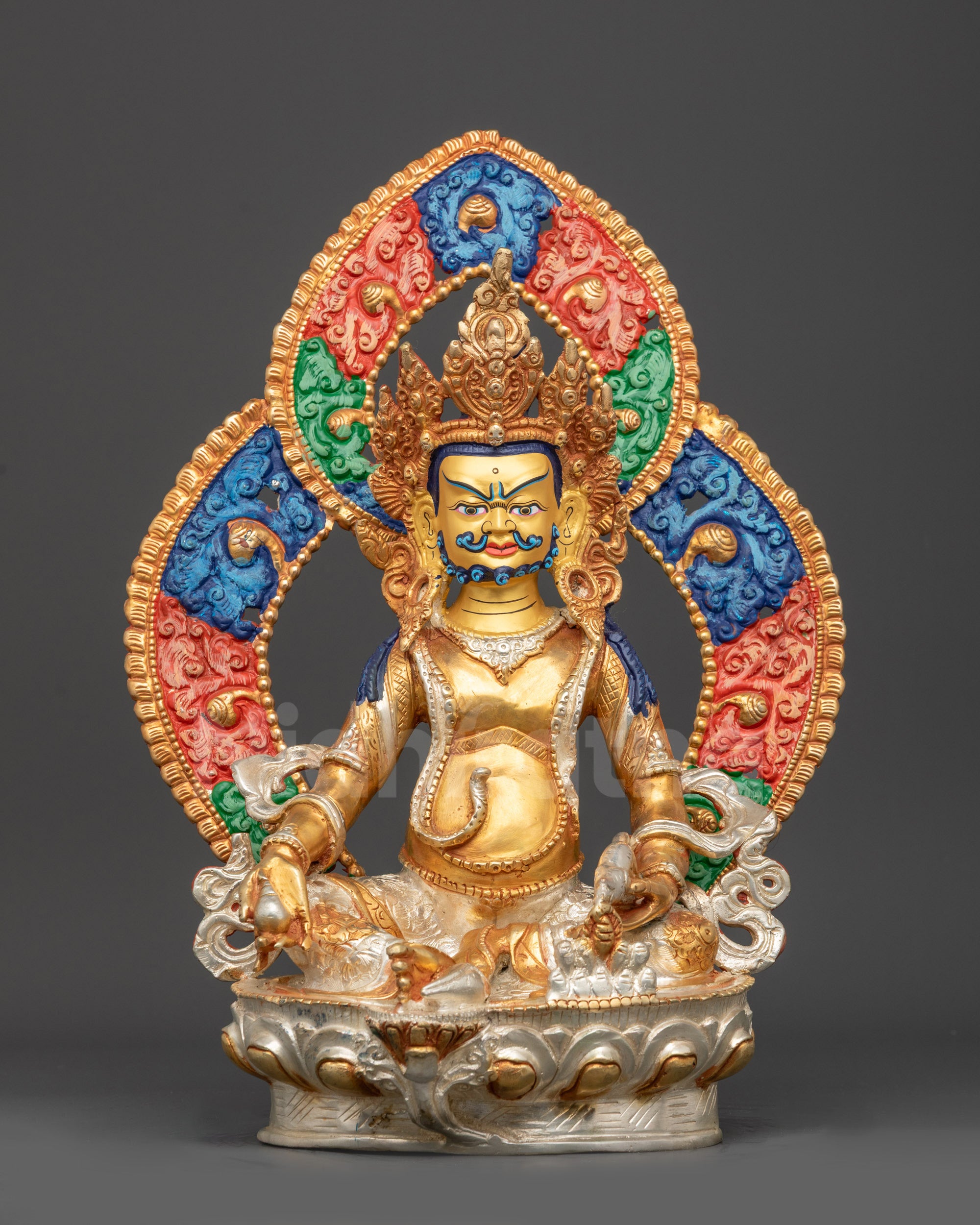 Front view of Yellow Dzambhala Statue on silver lotus throne with gold-gilded face
