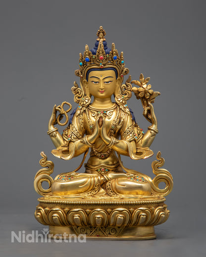 hand‑carved Chenrezig statue with 24K gold fire‑gilded body and precious stone inlaid face, seated on a lotus throne.