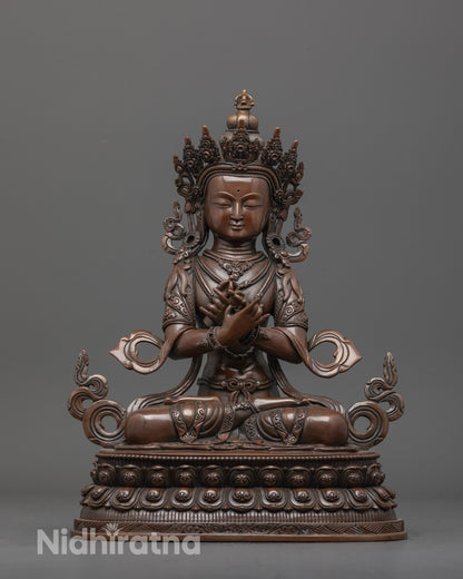 Front view of authentic oxidized Vajradhara statue with intricate carvings and double lotus base