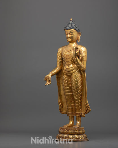 Front view of copper Standing Buddha sculpture with 24k gold plating standing