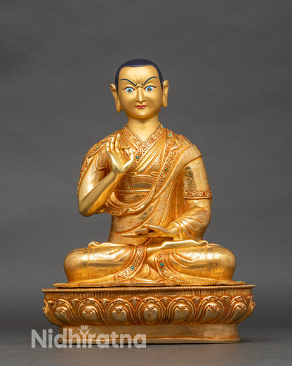 Front view of disciple statue, seated in devotion beside Tsongkhapa, Nepalese craftsmanship